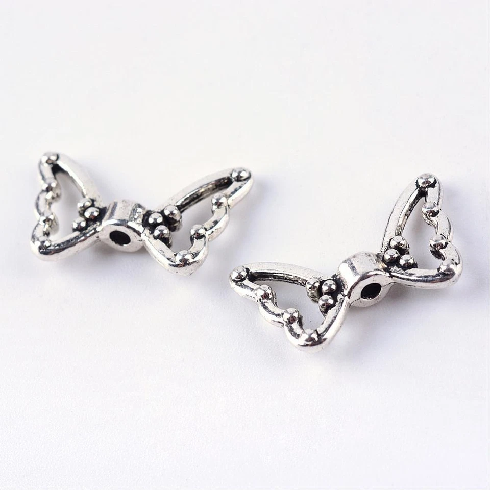 Tibetan Silver Spacer Beads Angel Wings Hollow Butterfly 18mm x 11mm 20pcs - Image 1 of 3