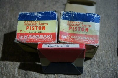 KAWASAKI  Z400 74-77 PISTONS AND ONE SET OF RINGS 1.00 MM O/S 13027-063 OEM NOS - image 1 of 4