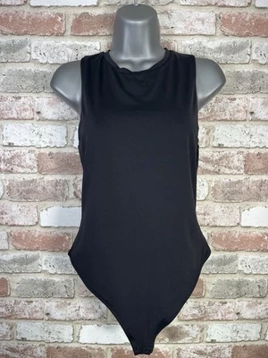 Body sin mangas Babaton Contour talla grande negro sin mangas cuello redondo Aritzia Top Foto 1 de 4