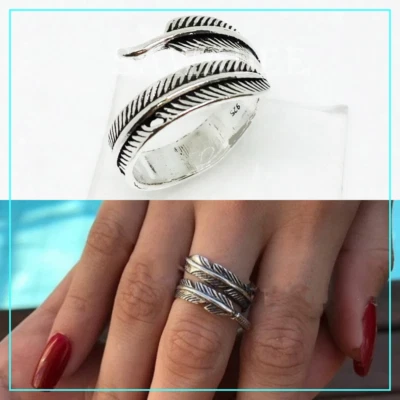 Anello piuma da donna in argento 925 fascia contrarie regolabile uomo punk rock  - Immagine 1 di 4