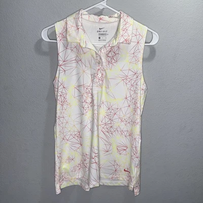 Polo sin mangas Nike Dri-fit para mujer talla geométrica talla pequeña ajuste estándar de golf Foto 1 de 4