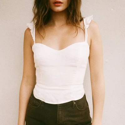 Camiseta sin mangas Reformation para mujer 6 corsé de lino blanco correa con volantes sin mangas Y2K Foto 1 de 4