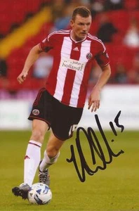 SHEFFIELD UNITED: NEILL COLLINS SIGNED 6x4 ACTION PHOTO+COA - Picture 1 of 1