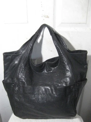 Bolso hobo grande OrYany de cuero negro. Foto 1 de 4