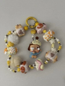 Crybaby etui na telefon charm bransoletka żółta - Zdjęcie 1 z 3