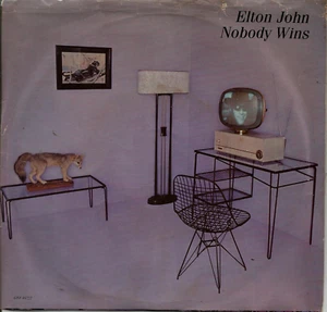 ELTON JOHN - NOBODY WINS / FOOLS IN FASHION - CANADA - 7" - 1981 - Picture 1 of 2
