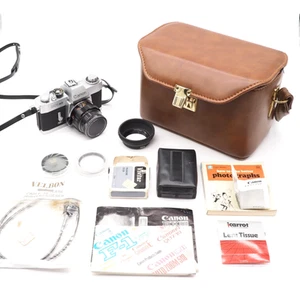 Canon EX Auto 35 mm fotocamera reflex pellicola (argento) con custodia rigida, filtri, flash, manuale - Foto 1 di 11