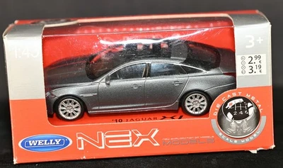 Jaguar XJ 2010 plateado gris metálico 1:43 diecast Welly NEX como nuevo en caja Foto 1 de 4
