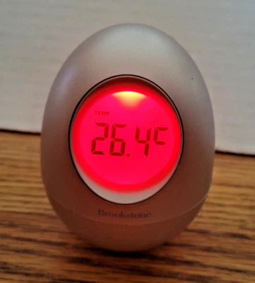 Brookstone Egg Clock. Time, Alarm, Temperature, Date, Timer. Multi-Color Display - Image 1 of 4