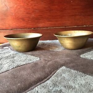 a pair of Tibetan antique brass bowls