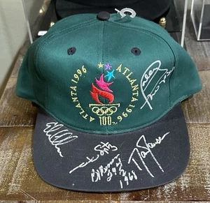 Autographed 1996 Atlanta Olympics Mark Spitz-Bob Beamon-Edwin Moses + Signed Hat - Picture 1 of 8