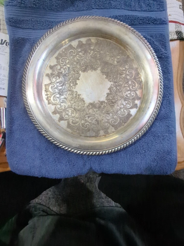 Bandeja decorativa vintage redonda plateada Foto 1 de 1