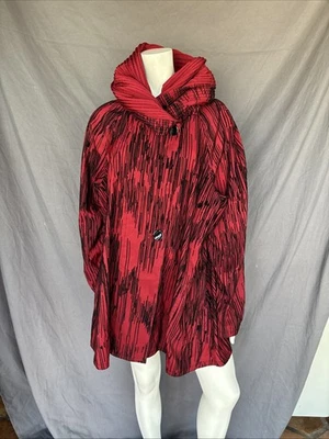 Abrigo impermeable reversible Mycra PAC Now Donatello talla 3-1X negro rojo texturizado Foto 1 de 4