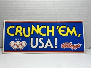 Vintage 1984 KELLOGG'S Bumper Sticker US Olympics Team USOC Crunch Em USA - Picture 1 of 3