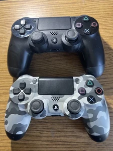 PlayStation DualShock 4 Wireless Controller - Black + Camo (2-Pack) - Picture 1 of 5