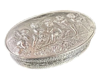 Caja de tabaco Continental 800 plateada ovalada con putti Foto 1 de 4