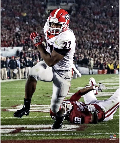 Nick Chubb Georgia Bulldogs Unsigned Escapes Tackle Photograph Cover