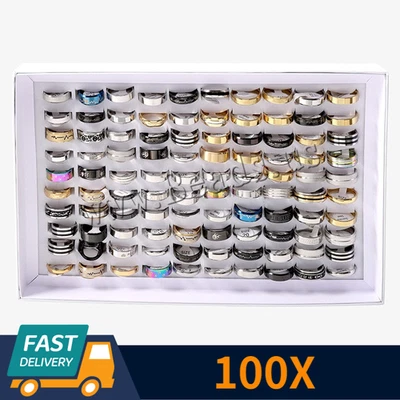 100 X ANILLOS DE MODA PARA HOMBRE Y MUJER AL POR MAYOR LOTE A GRANEL ANILLOS DE ACERO INOXIDABLE MEZCLADOS Foto 1 de 4