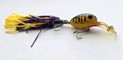 Señuelo de pesca vintage Arbogast ojo de insecto amarillo Coachdog - cola púrpura/amarilla Foto 1 de 4