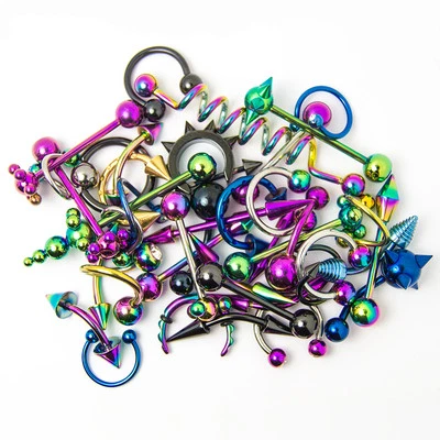 Venta al por mayor Paquete de 20 Piercings Corporales Mixtos IP Titanio Diseños Surtidos Foto 1 de 4