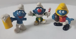 Fútbol americano vintage de los Pitufos ('80), payaso ('79), beber cerveza ('75) Schleich peyo - Imagen 1 de 17