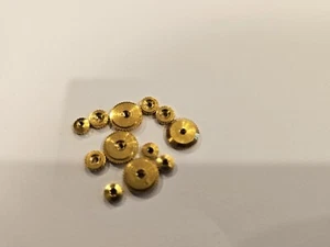 12 tuercas de mano de reloj Hermle American métricas eje de 2 mm mezclado nuevas - Imagen 1 de 4