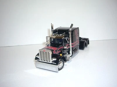 DCP FIRST GEAR 1/64 BLACK WITH RED STRIPES PETERBILT 359 WITH 63" SLEEPER - Image 1 of 4
