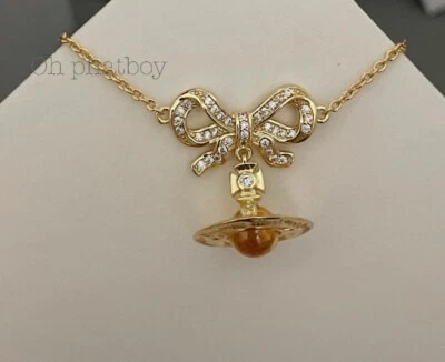 Vivienne Westwood Gold Tone Elegant Bow yellow 3D Orb Pendent Short Necklace - Image 1 of 4