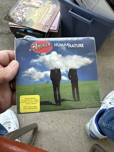 AMERICA : HUMAN NATURE 1998 NEW SEALED OXYGEN RECORDS CD - Picture 1 of 1