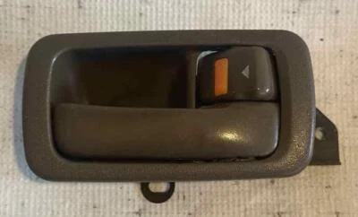 Toyota Camry 1993 conductor delantero interior manija de puerta bronceado usado OEM Foto 1 de 2