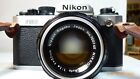 Nikon Fm2 With Nikkor 50 Mm F1,4 Lens,With Front Lens Cap And  Leather Strap