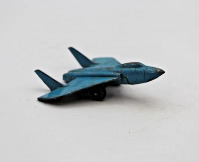  Avión a reacción Midgetoy azul marino de metal fundido - Rockford IL de colección Foto 1 de 4