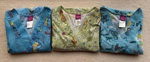 Lot of 3 Wonderful World Of Disney Women's Scrubs - Sz M (2 Tinkerbells, Bambi) - Picture 1 of 21