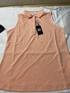 Polo sin mangas con estampado de puntos de golf FootJoy para mujer talla pequeña color melocotón - Imagen 1 de 8