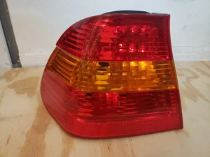 2002-2005 BMW 3 Series 325xi Left Driver Side OEM Tail Light - Nuts Included - Picture 1 of 6