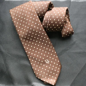 Corbata vintage CHRISTIAN DIOR blanca a lunares sobre polietileno/seda marrón - Imagen 1 de 4