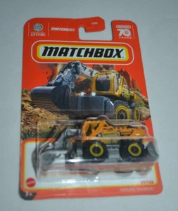MATCHBOX 2023 MOUNTAIN EXPLORERS 27/100 - AGARRADOR DE TIERRA AMARILLO Y GRIS - Imagen 1 de 4