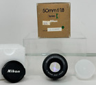 Objectif principal à mise au point manuelle Nikon série E 50 mm f/1,8 - boîte d'origine et protecteurs