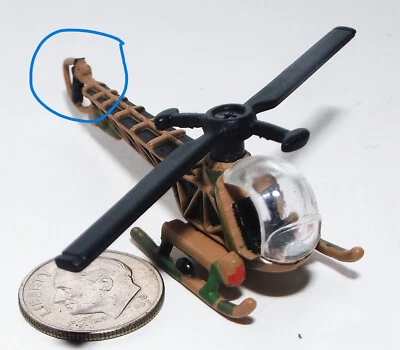 Small Micro Machine Bell 47-D Helicopter in Camouflage as seen on M*A*S*H - Image 1 of 4