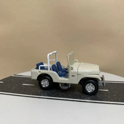 Johnny Lightning Working Class Trucks & SUV Jeep CJ5 White w/Blue Seats 1:64 NM - Image 1 of 4