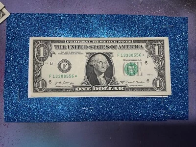 Star note $1 bill error  F13388556, and filled star  - Image 1 of 4