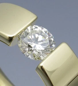 DISEÑO MADURO - ANILLO TENSOR BRILLANTE DE ALTA CALIDAD - ORFEBRERÍA PROPIA - ORO 585 - Imagen 1 de 10