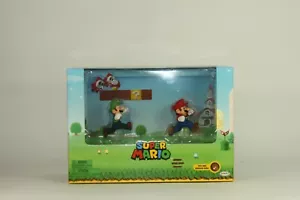 Figure di Super Mario Bros. Mario e Luigi con sfondo interattivo NUOVO - Foto 1 di 4