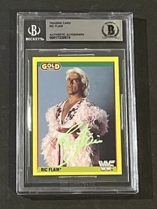 RIC FLAIR 1992 MERLIN GOLD WWF SIGNED AUTOGRAPHED CARD BECKETT BAS AUTHENTIC - Picture 1 of 2