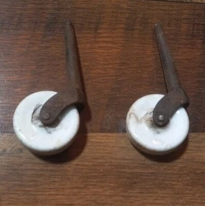 Antique Furniture Caster Wheels Set of 2 Matching White Porcelain Iron Stem - Picture 1 of 8