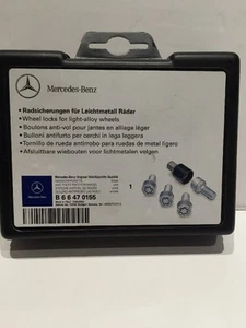 Mercedes Benz Original Teile/ Geprufte OEM WHEEL LOCK SET IN SILVER - Picture 1 of 5