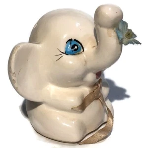 Pajarita vintage BANCO ELEFANTE ojos azules rosa con tapón - Imagen 1 de 9