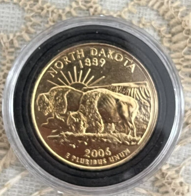 Genuine 24kt gold plated 2006 North Dakota quarter - Image 1 of 2