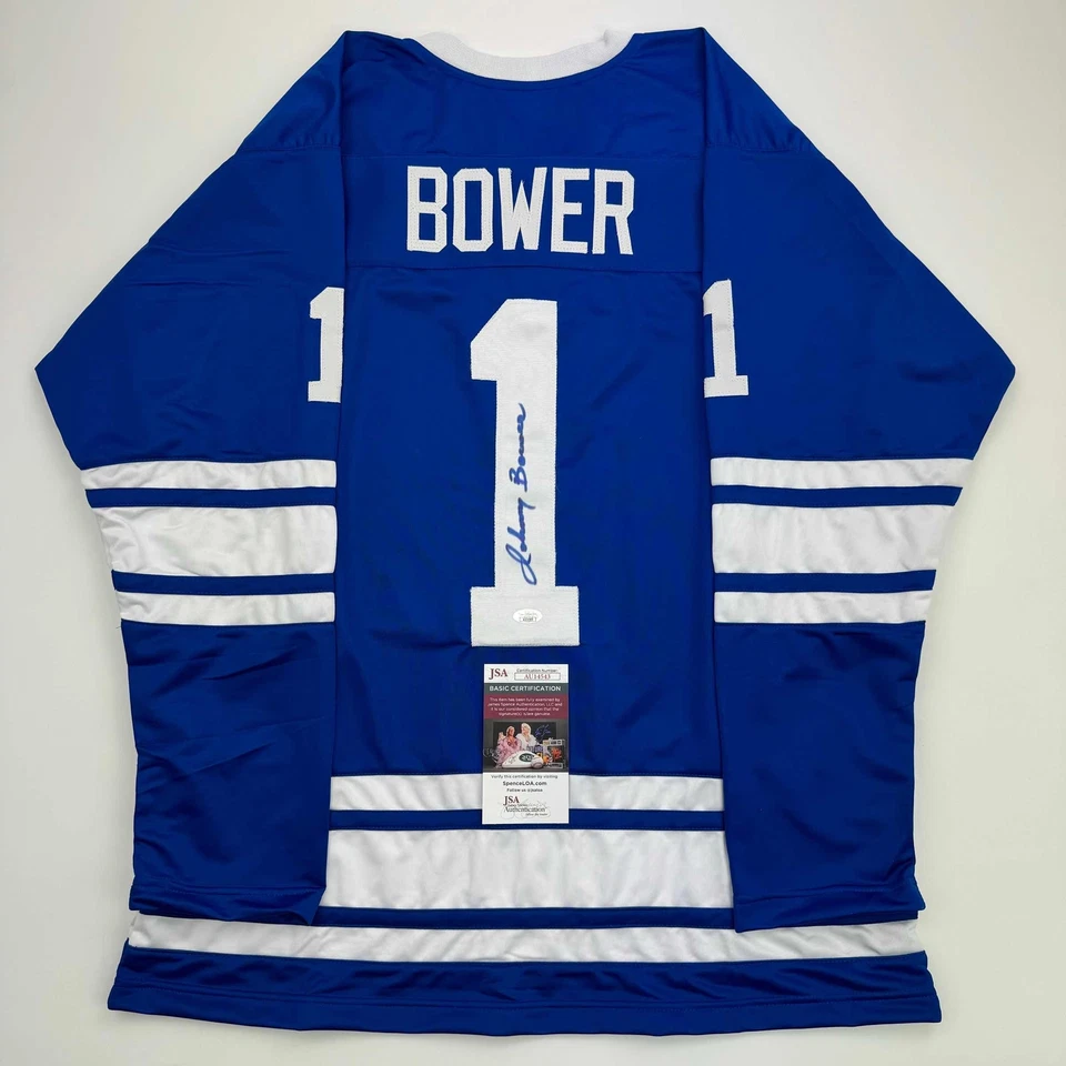 Autographed/Signed Johnny Bower Toronto Blue Hockey Jersey JSA COA - Image 1 of 4