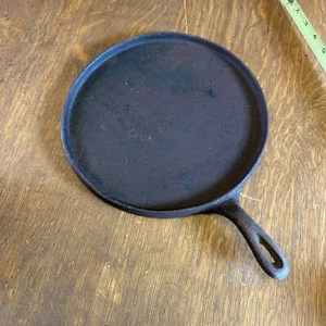 Plaque de cuisson ronde en fonte 10" - Photo 1/14